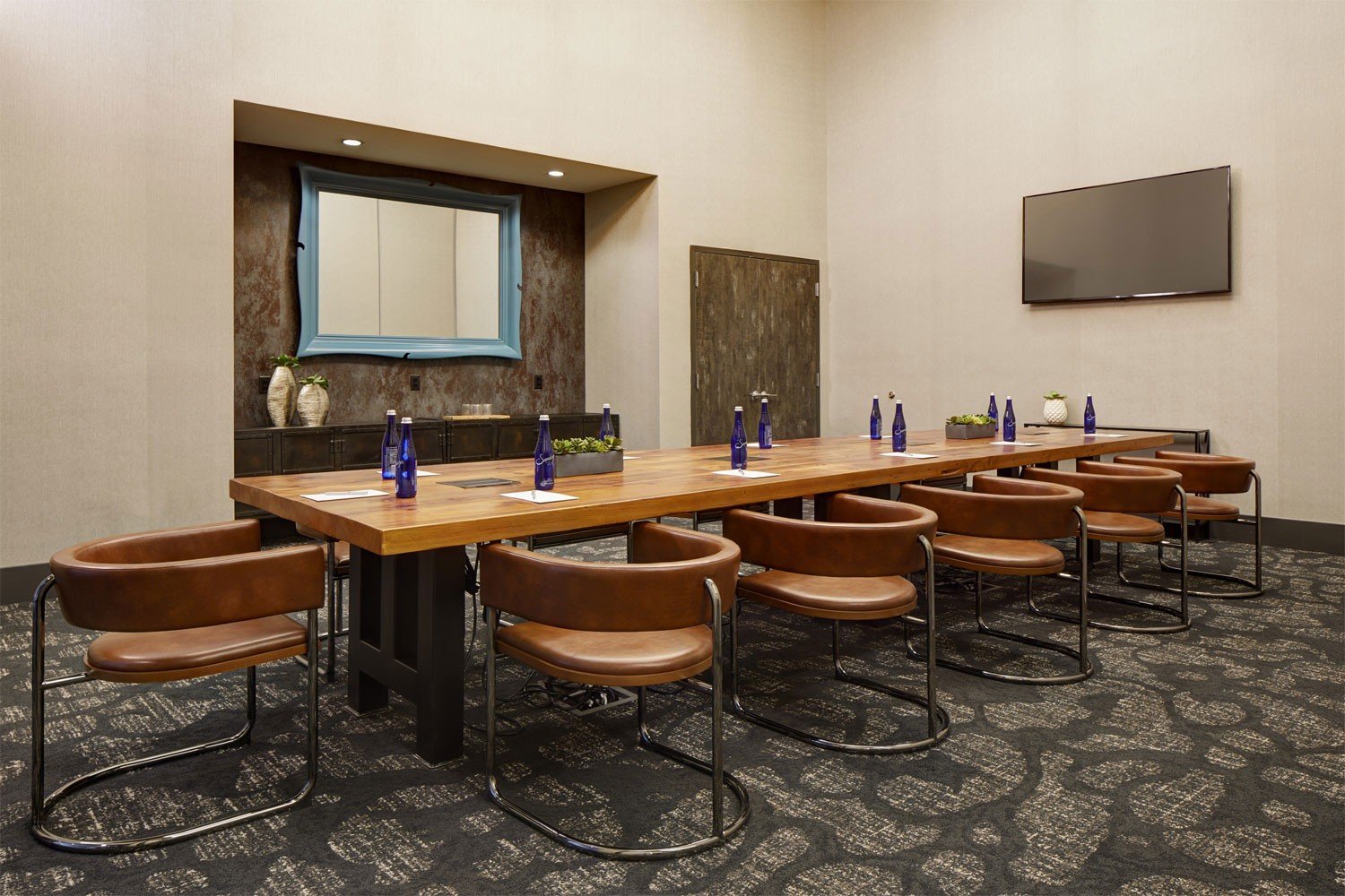 Archer Hotel Florham Park - Boardroom with bottled water and notepads