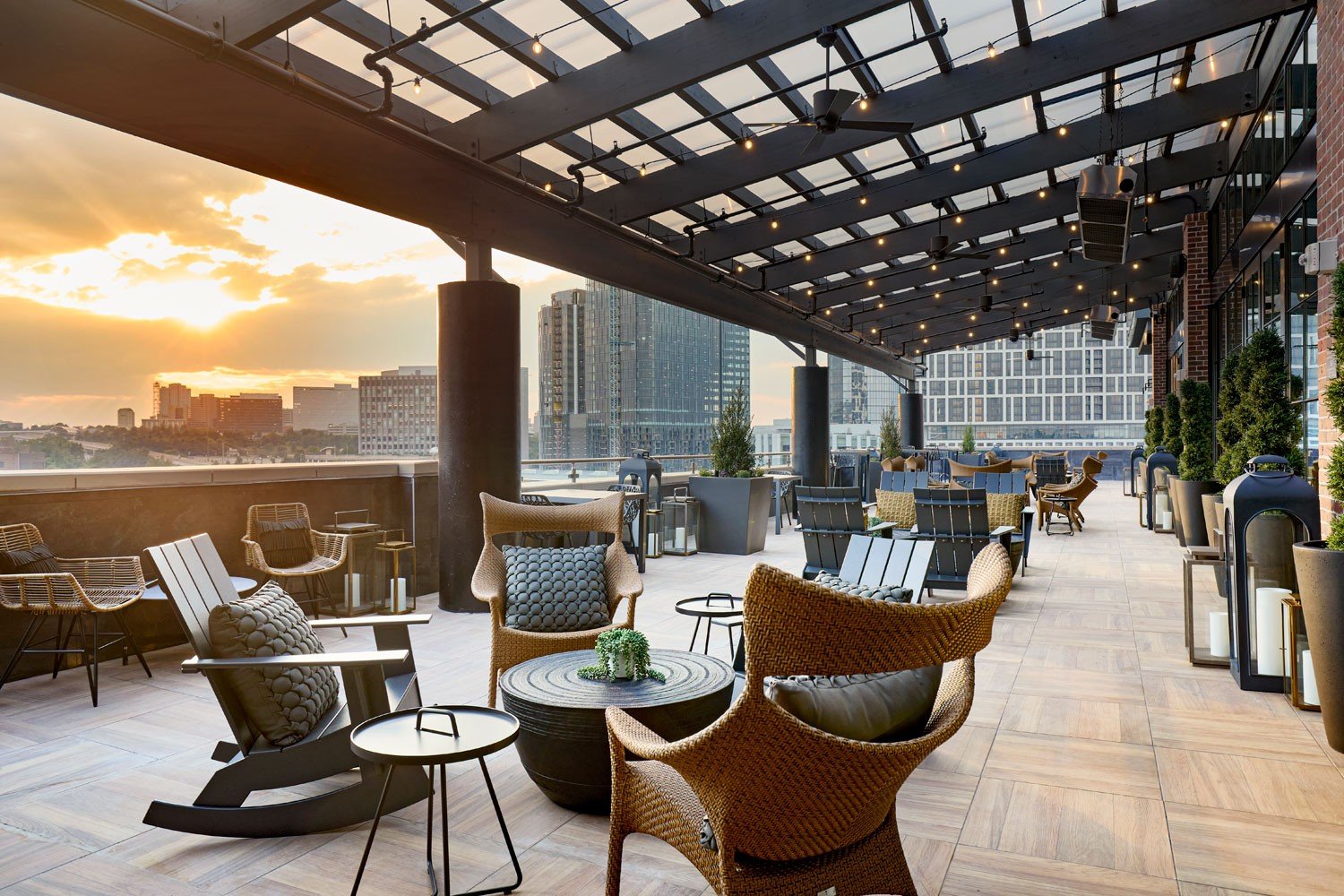 Archer Hotel Tysons - Penthouse Terrace seating at sunset