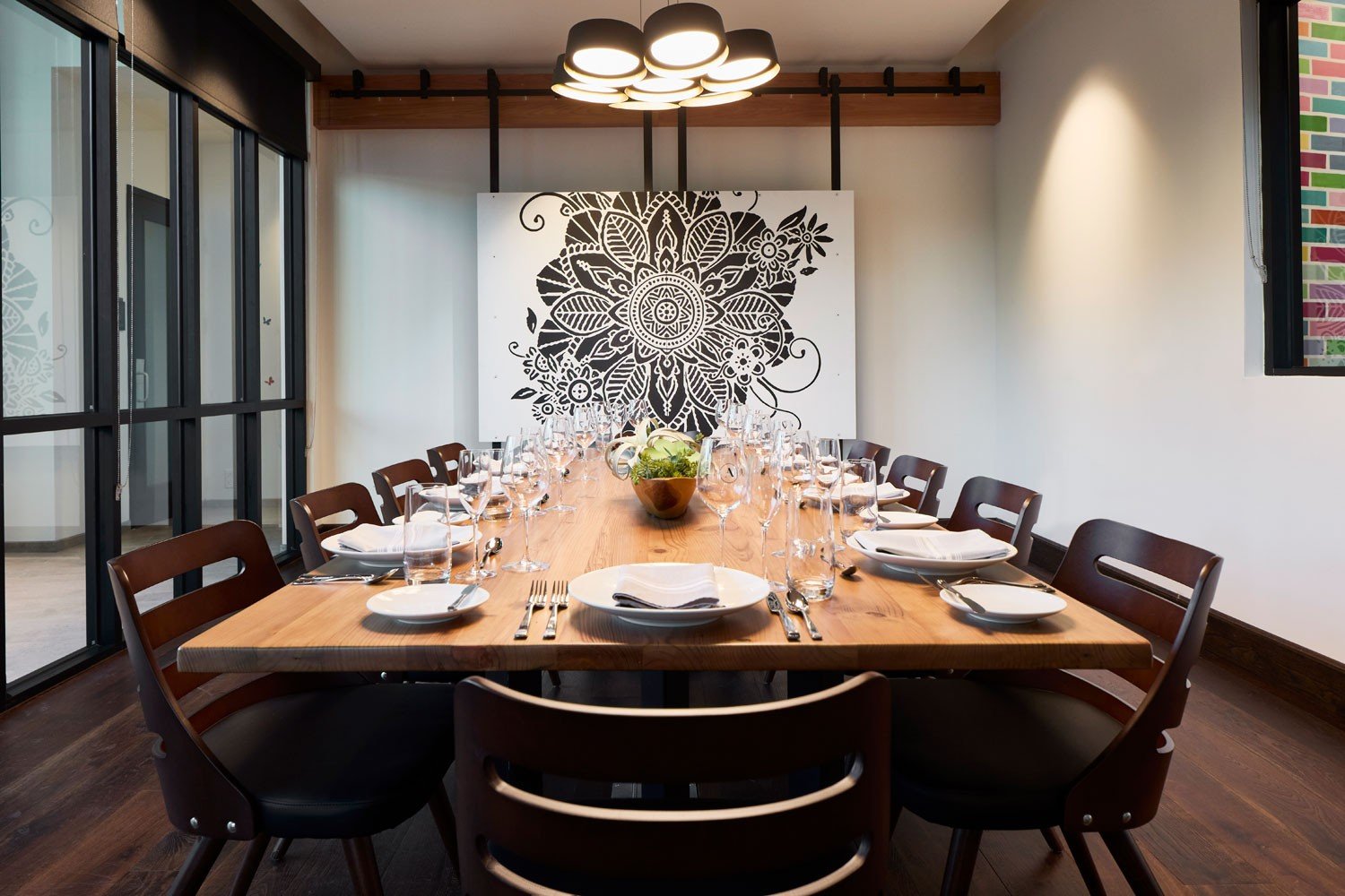 Archer Hotel Tysons - Private dining table with wall art