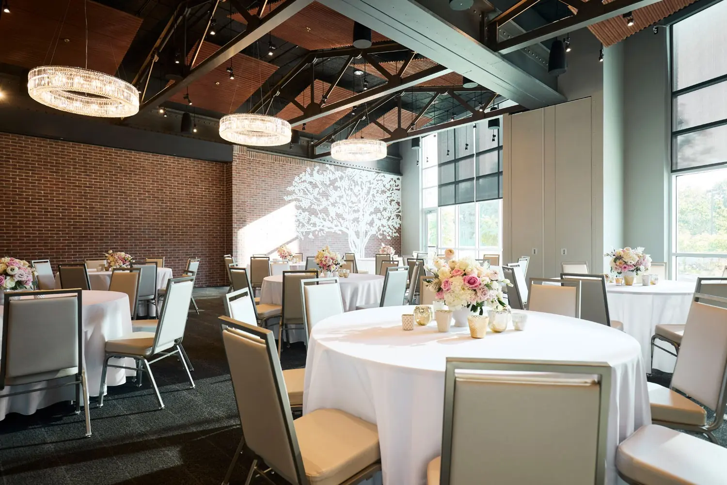 Archer Hotel Tysons - Roundtables with cloth and chairs in The Great Room