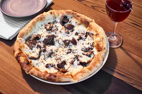 Pizza and cocktails at Archer Napa's Sky & Vine Rooftop Bar