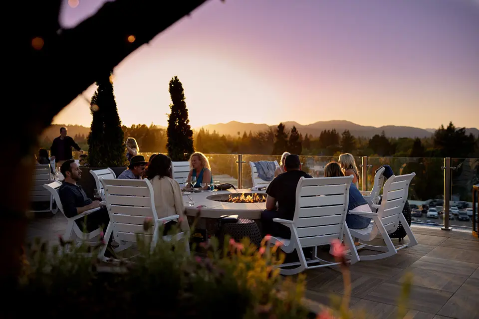Archer Hotel Napa's Sky & Vine, a rooftop bar with a firepit