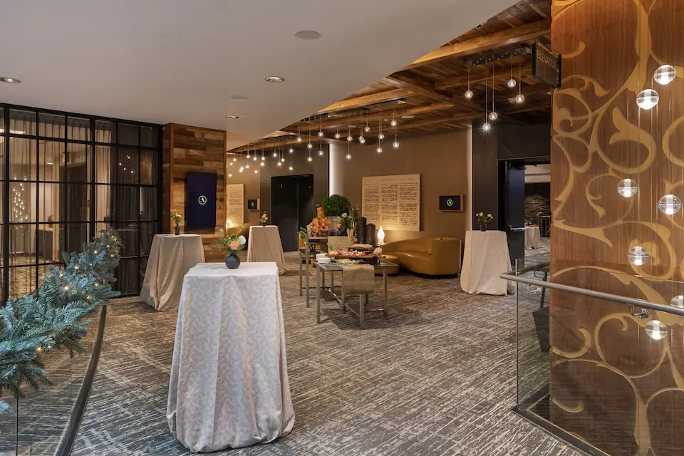 Grand Salon Foyer - event venue with cocktail tables and a buffet of appetizers