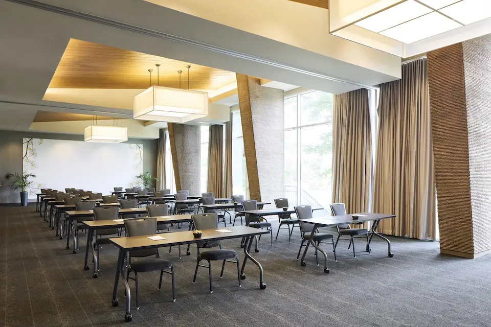 Great Room - meeting venue with classroom setup and floor-to-ceiling windows