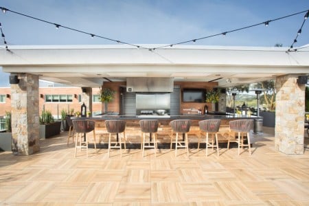Chef's Show Kitchen bar seating with lights — on the rooftop