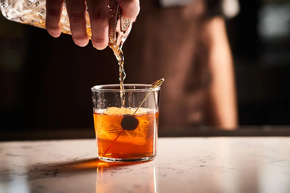 Redmond AKB bartender making Old Fashioned cocktail
