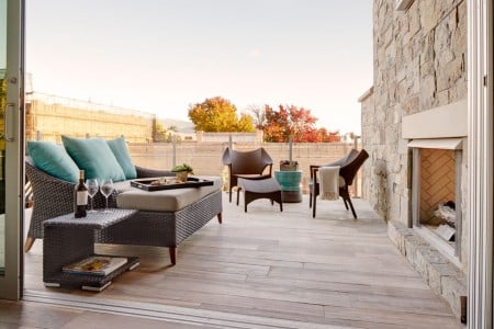 Archer's balcony experience with gas fireplace and lounge seating