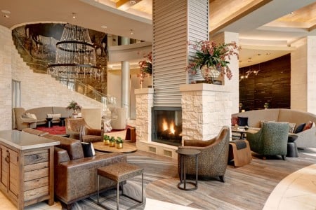 Archer Hotel Austin Lobby with fireplace and seating areas