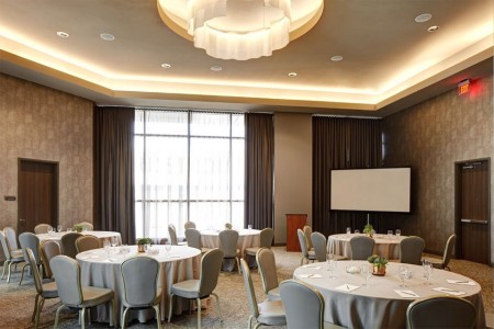 Archer Austin Hotel — Grand Salon with round tables