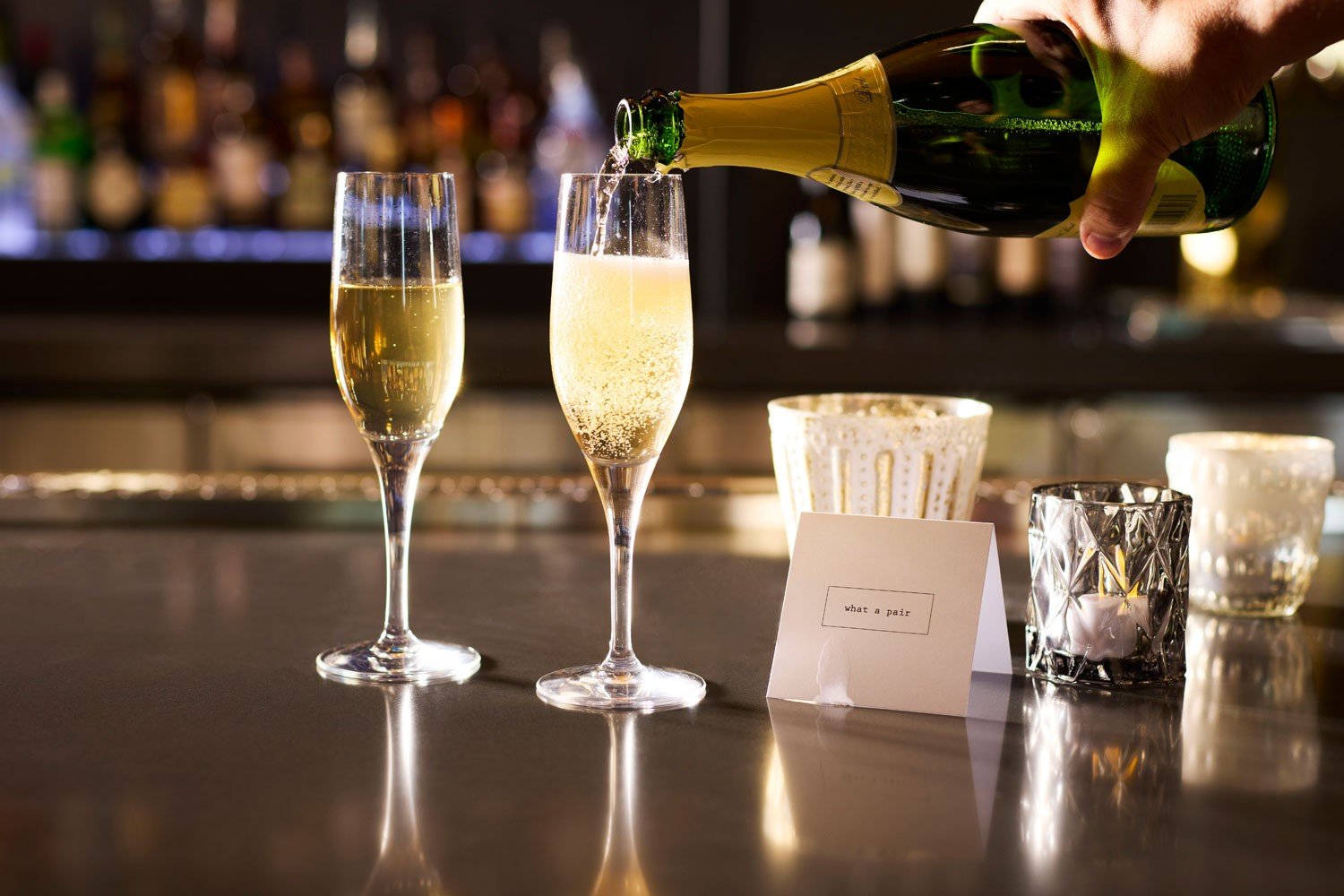Champagne pour at AKB bar at Archer Hotel Falls Church