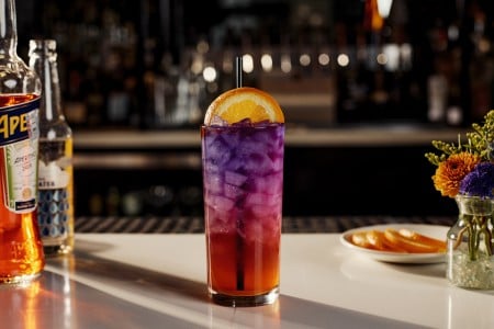 Violet Sky, a signature cocktail at AKB in Archer Hotel Austin