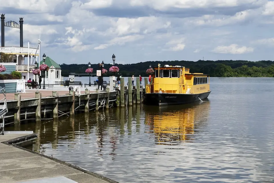 Old Town Alexandria - Potomac Water Taxi docked along a wooden pier