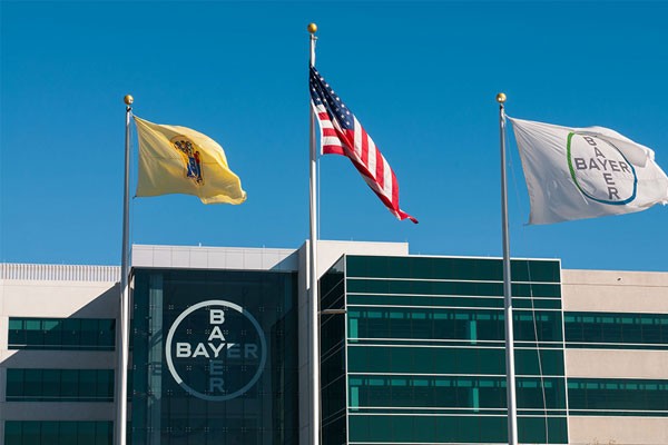 Three Flags in front of the Bayer Building 