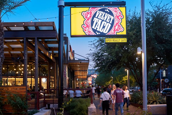 Velvet Taco Restaurant outdoor patio with sidewalk