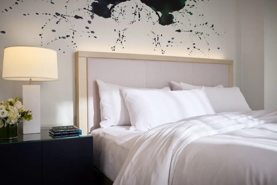 Presidential Suite - bed featuring white bedding