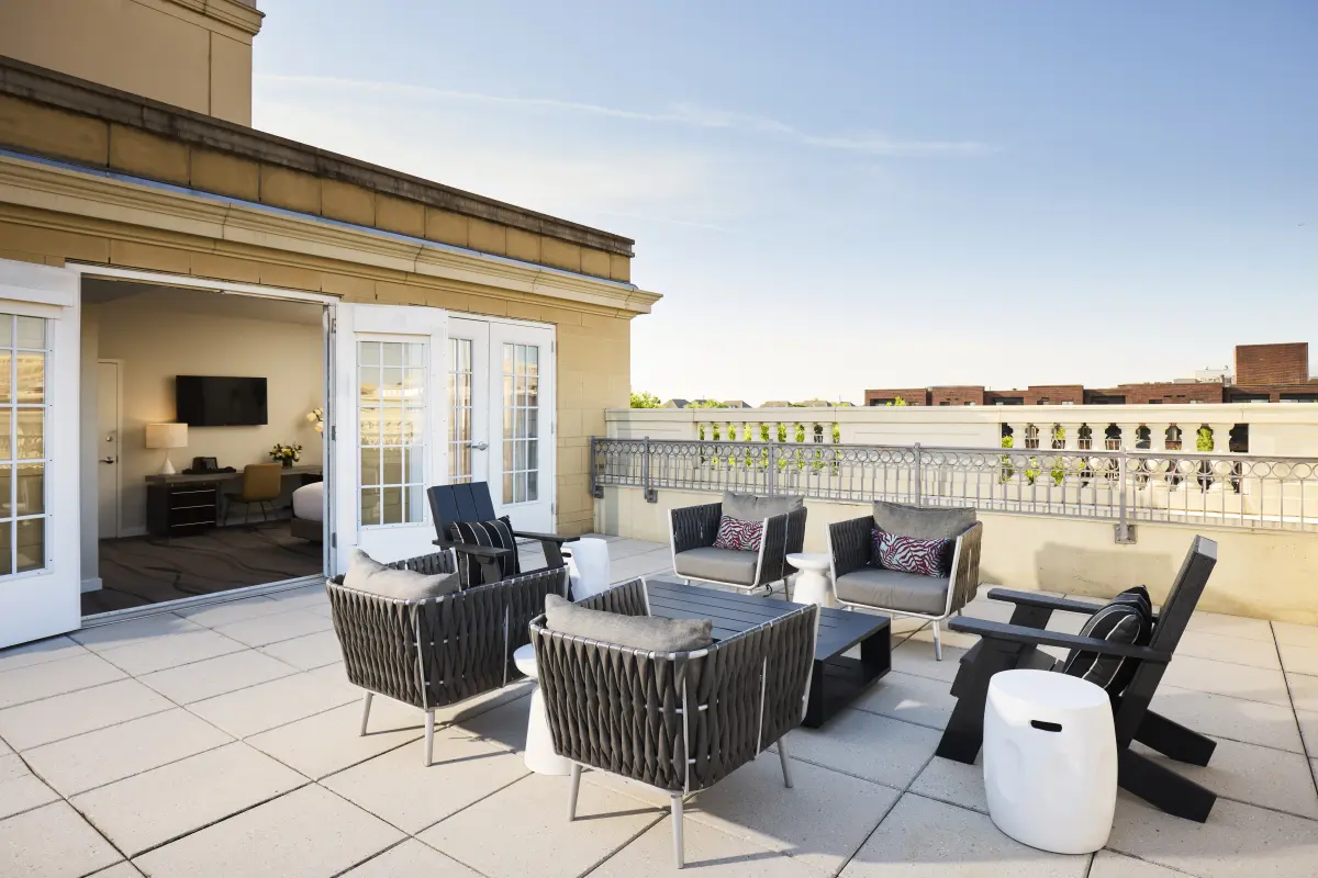 Ambassador Suite terrace with the view of the desk and TV