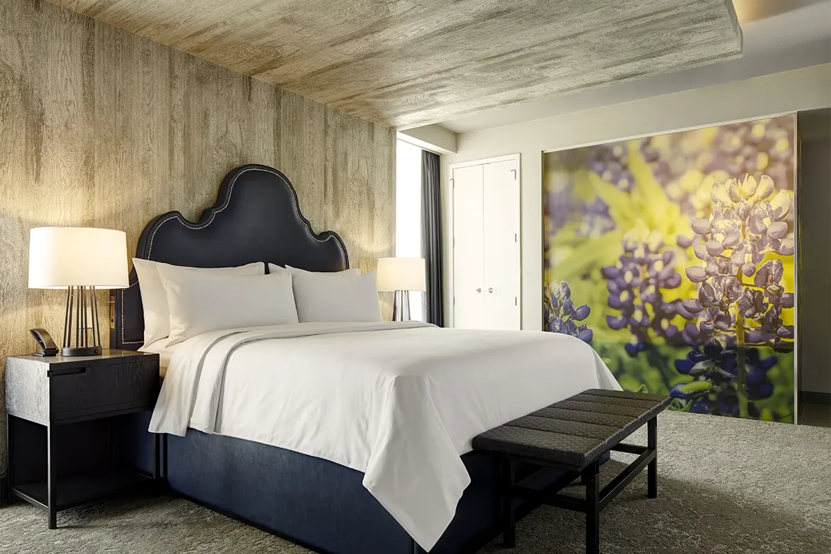 Archer's Den - bedroom with upholstered king platform bed
