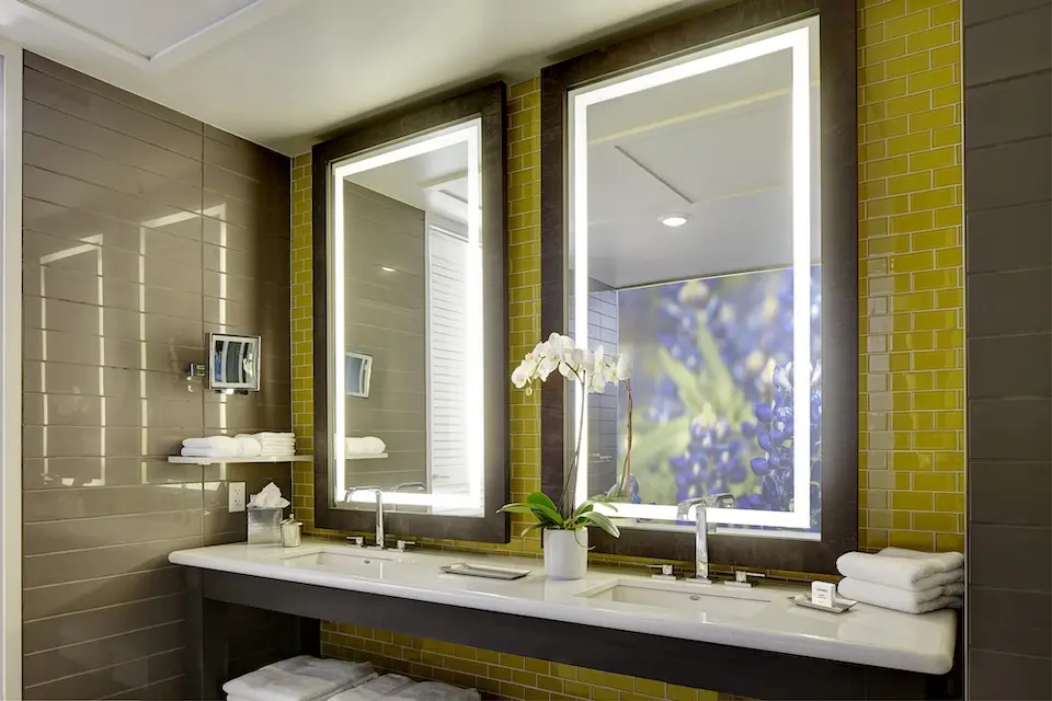 Archer's Den - modern bathroom with double vanity and mirrors