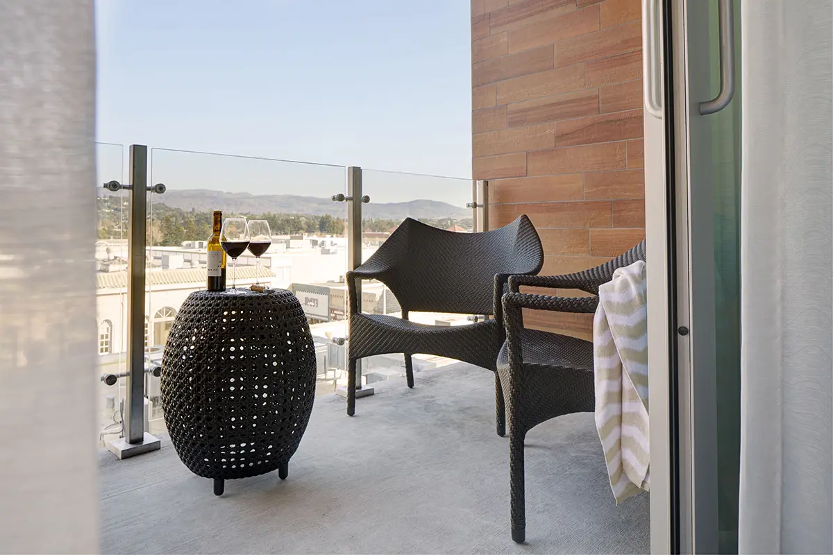 Private alfresco balcony with lounge seating and Napa Valley views
