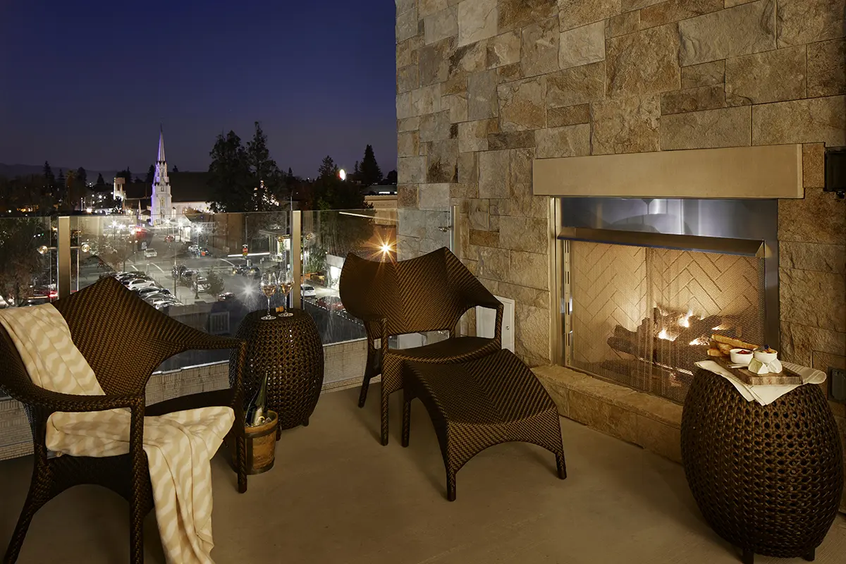 Archer's Den - private, furnished balcony with gas fireplace and views of downtown Napa