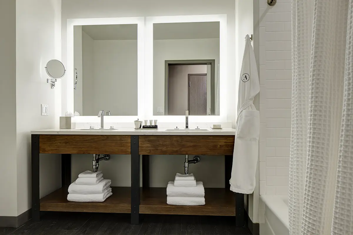 Double King - modern bathroom with a quartz double vanity and mirrors