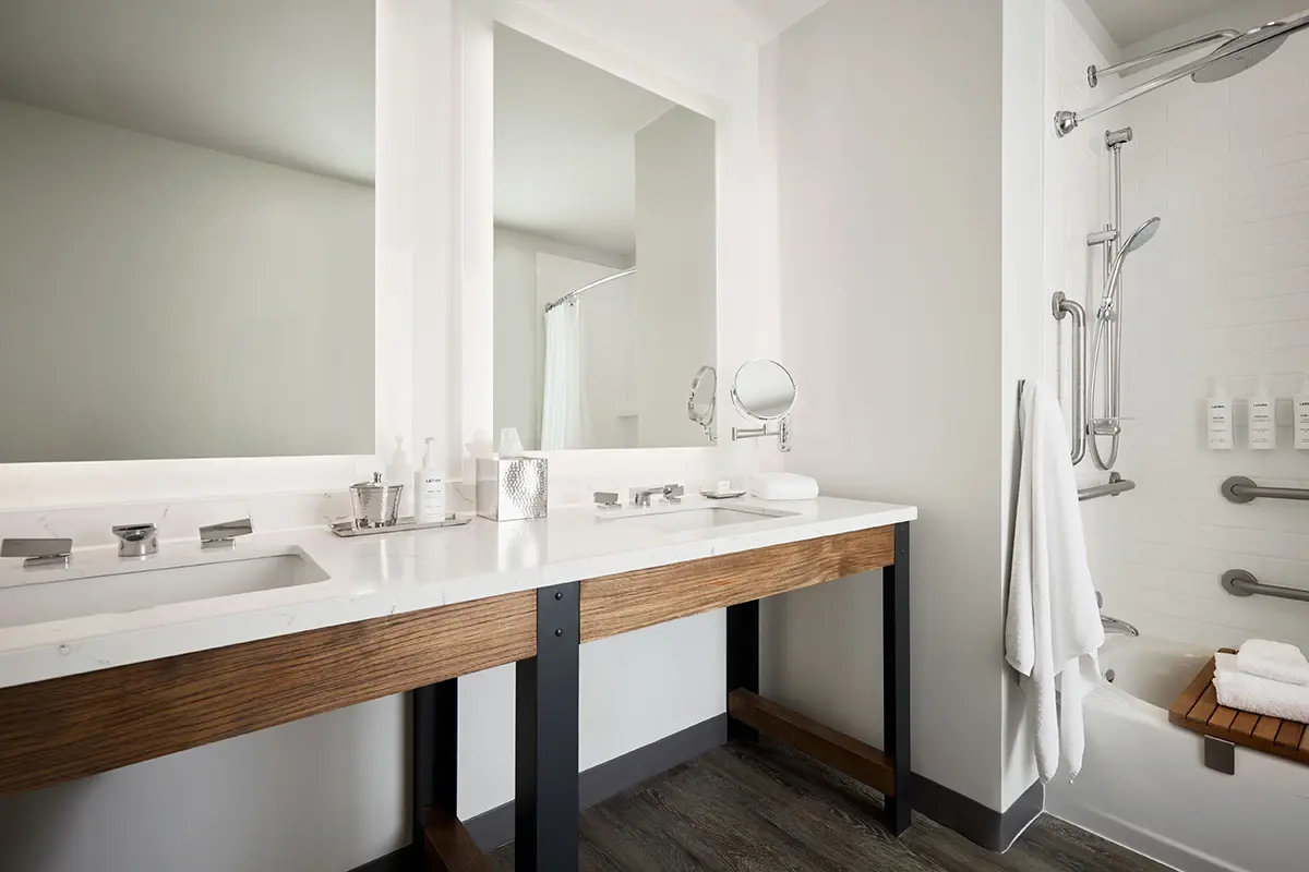 Double King - modern bathroom with a quartz double vanity and mirrors