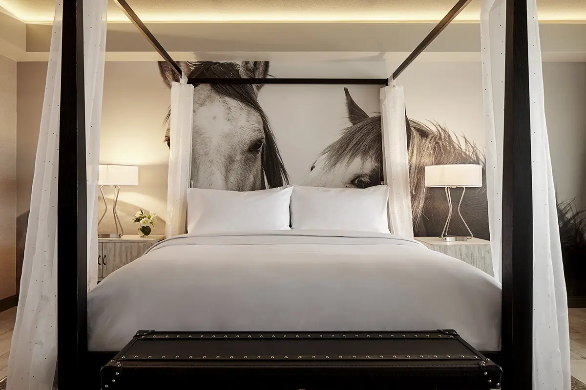 Archer King Suite - four-poster bed with five-star bedding and horse wall mural