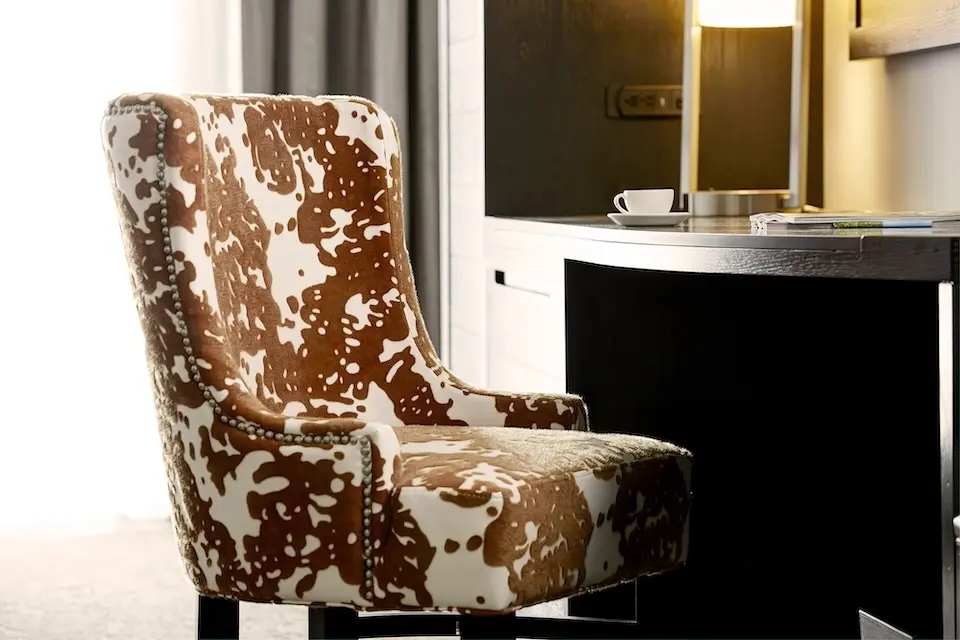 Archer King Suite - desk chair with cowhide print