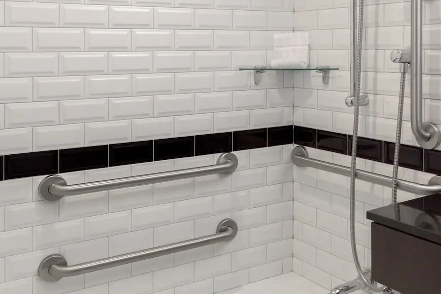 Classic King - mobility-accessible tub with hand-held shower wand and grab bars