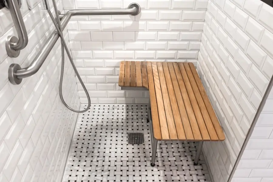 Classic King - mobility-accessible transfer shower with adjustable shower seat and grab bars