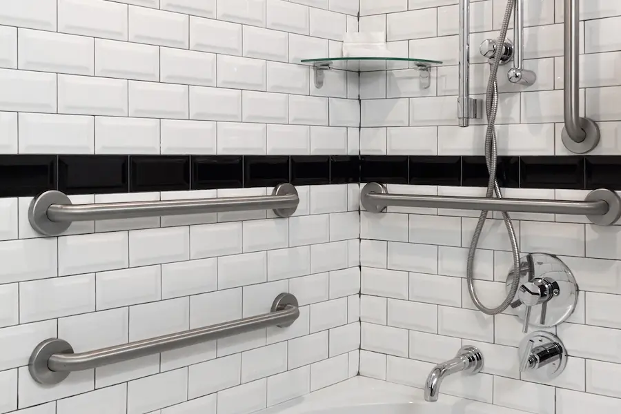 Double Twin Empire View - mobility-accessible tub with grab bars and hand-held shower wand