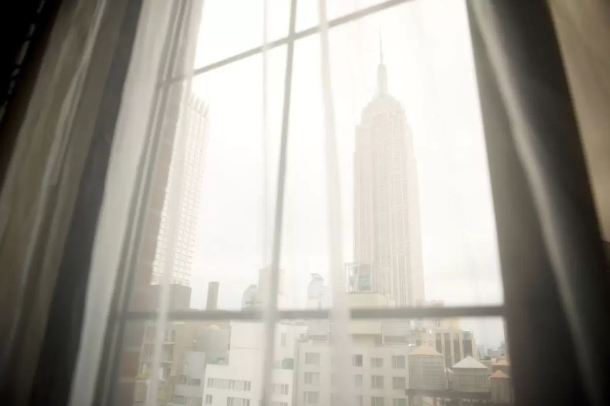 Archer King Empire View - view of the Empire State Building through sheer curtains