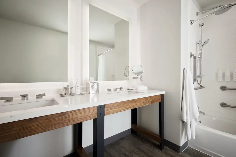 Double King - modern bathroom with a quartz double vanity and mirrors