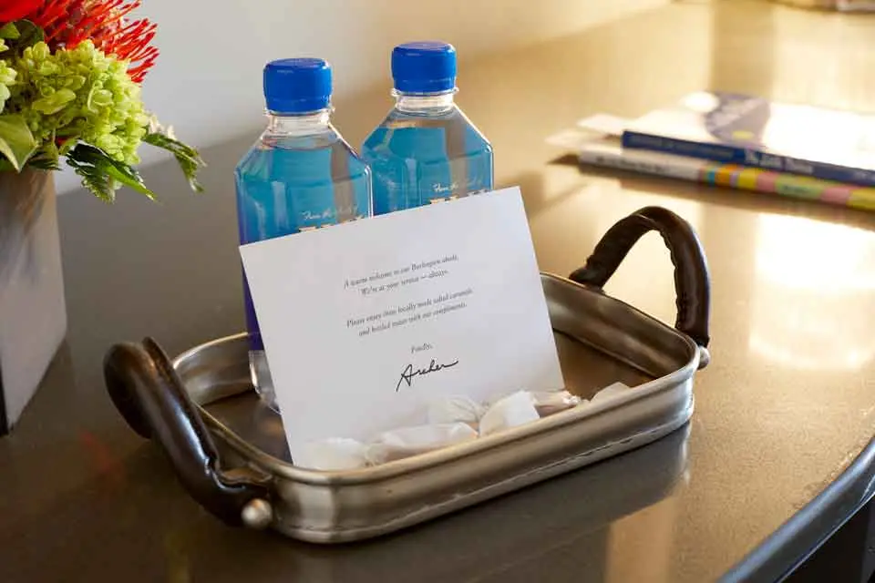 Archer's Den - welcome amenity of complimentary water, salted caramels and card