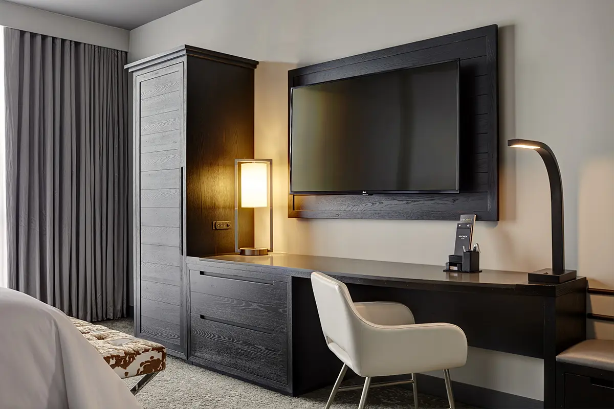 King Balcony Suite - desk and wall-mounted TV