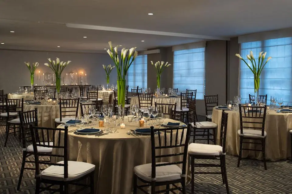 Round table set up with flower arrangements