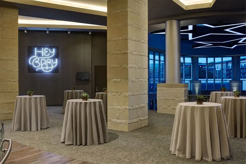 Archer Hotel Austin Landing with beige table covers