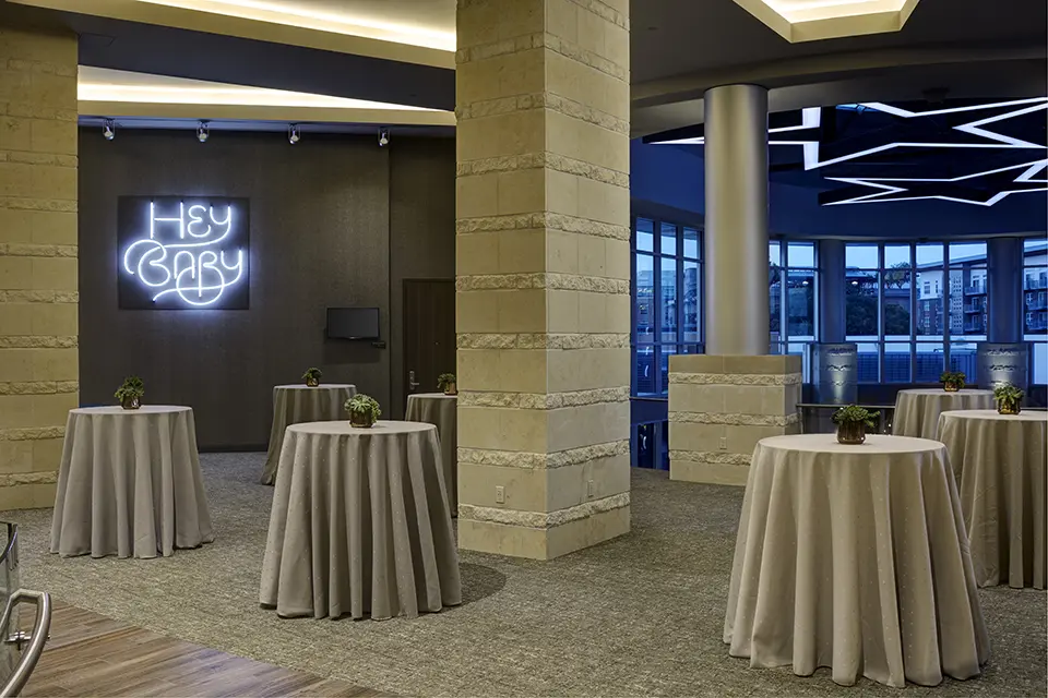 Archer Hotel Austin Landing with beige table covers