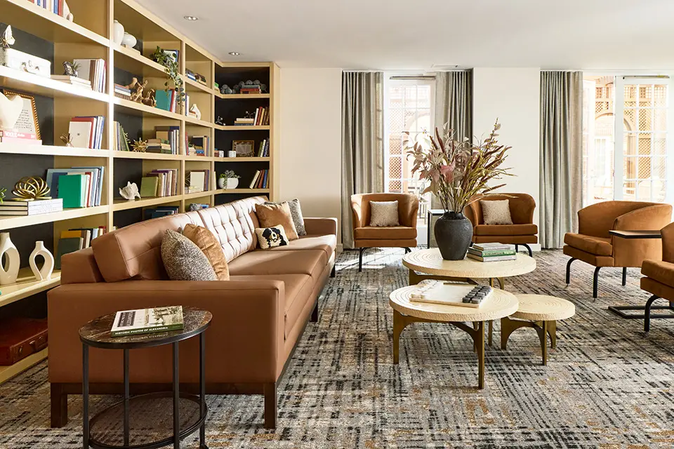 Living Room at Archer Hotel Alexandria - door opened