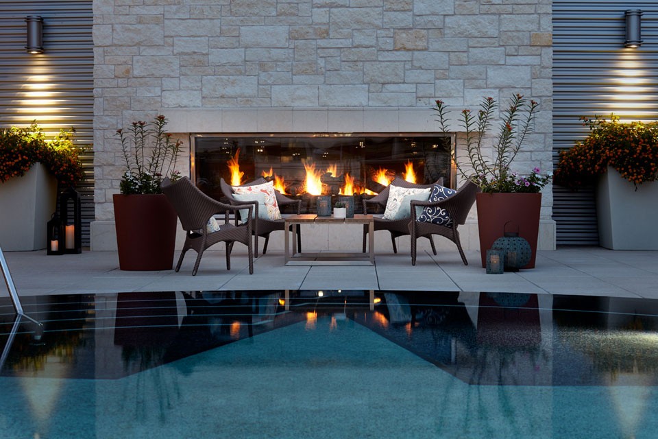 Archer Hotel Austin pool patio fireplace