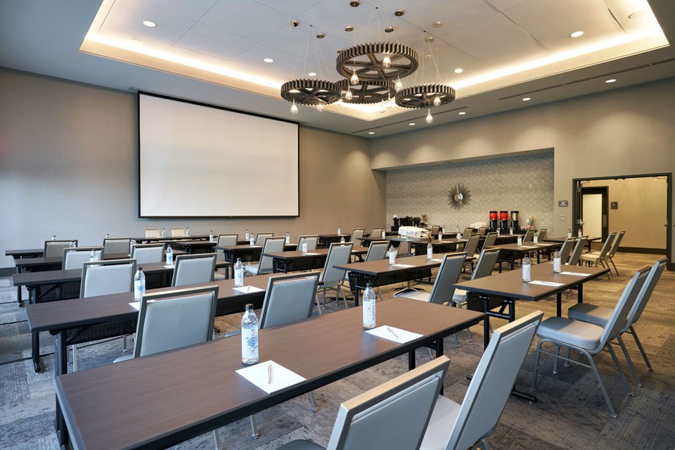 Archer Hotel Redmond the Great Room A classroom set up with a projector