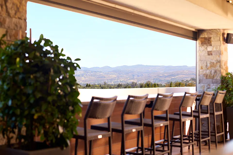 Archer Hotel Napa Rooftop Bar - seating with view closeup