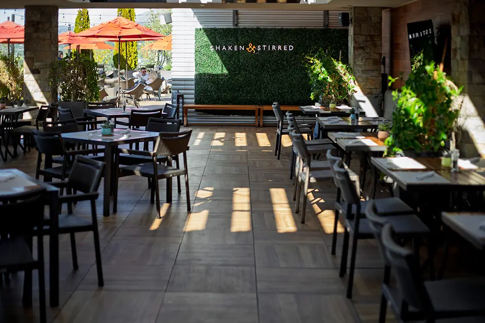 Covered seating at Archer's rooftop bar in downtown Napa