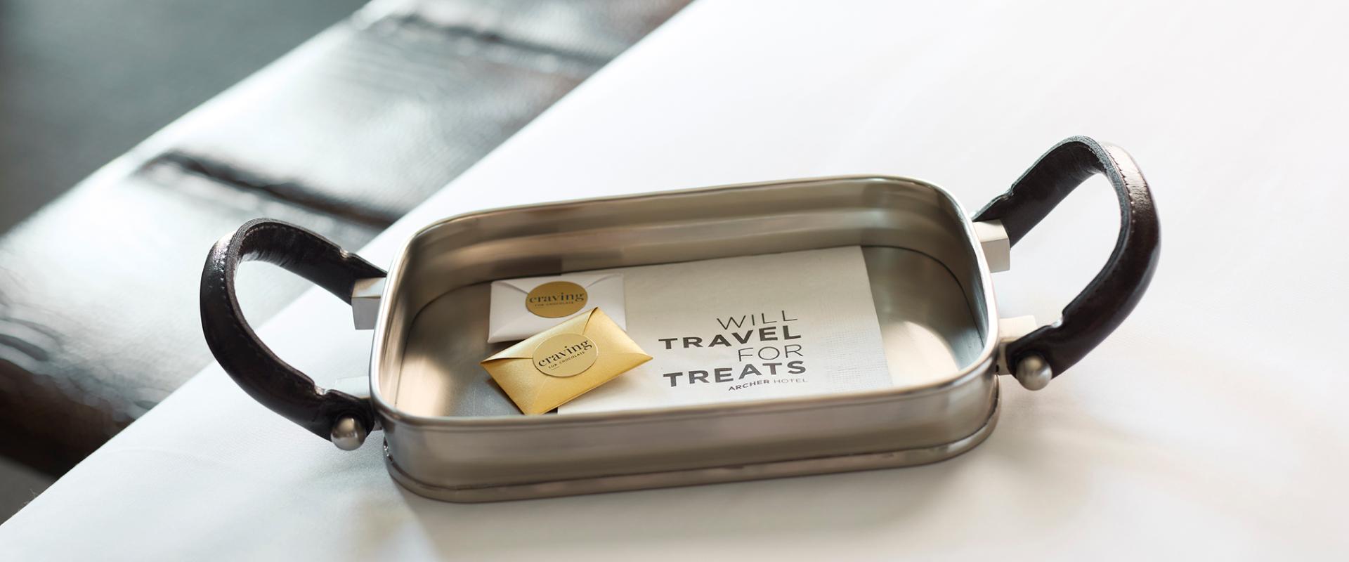 Chocolate turndown treat with napkin.